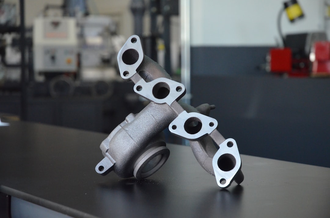 3D printed metal car suspension bracket lightweight additive manufacturing