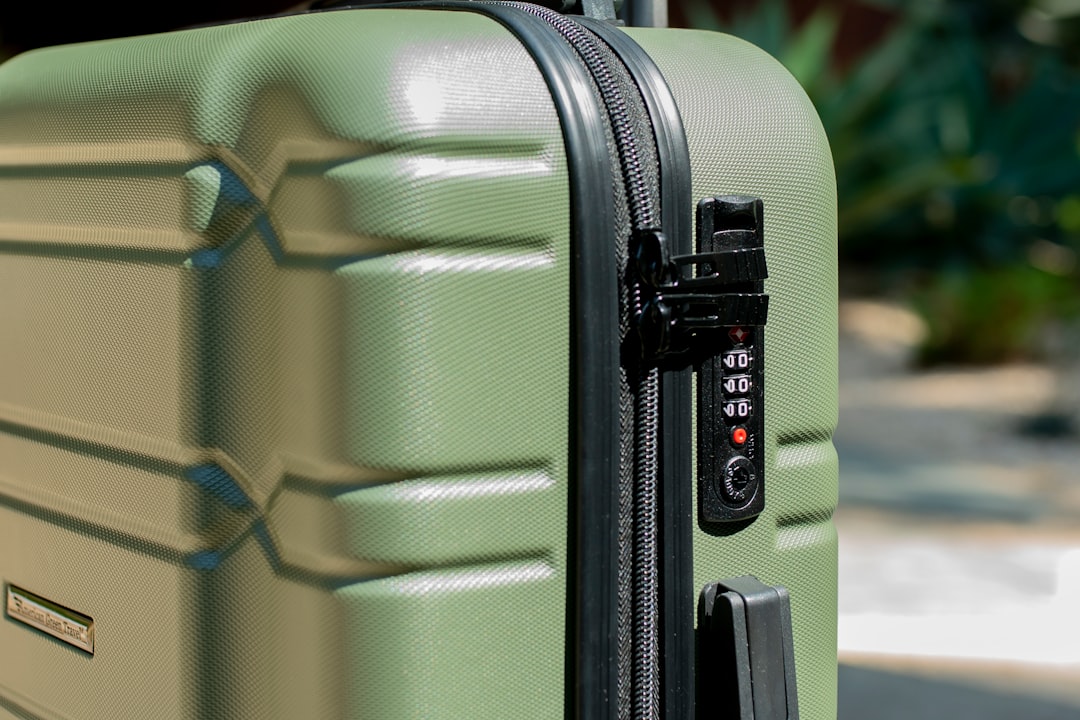 polycarbonate suitcase material close up, TSA lock luggage detail