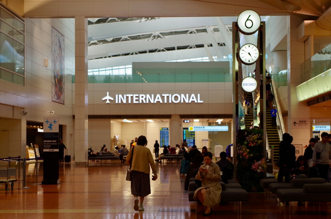 airport terminal interior navigation, crowded departure hall signage