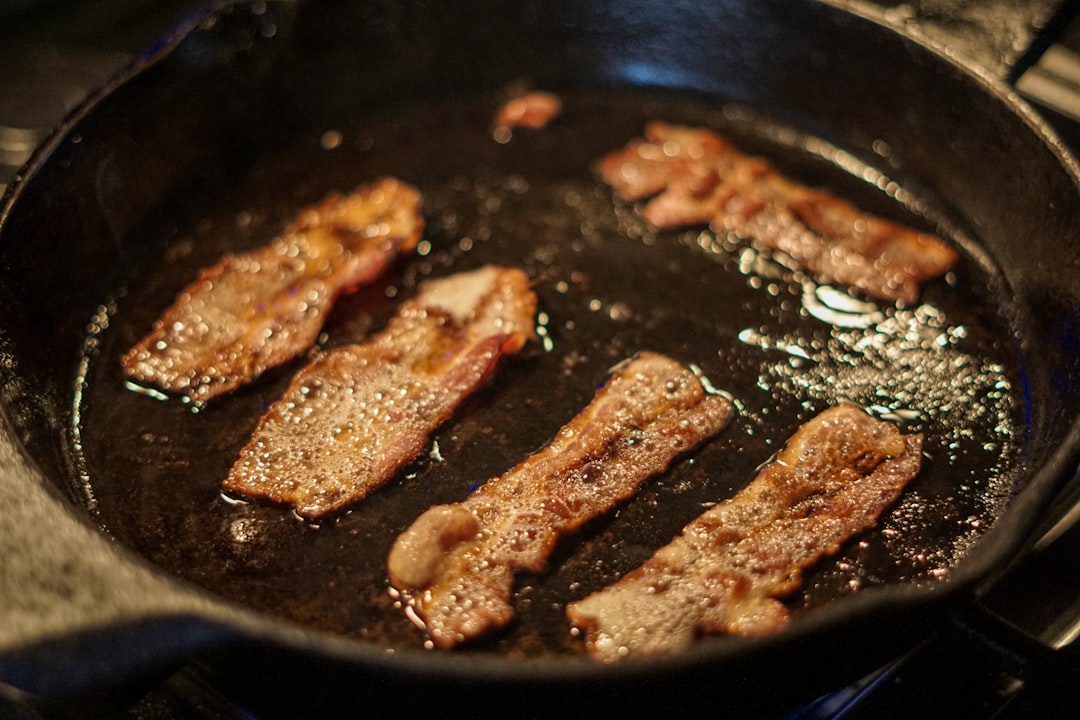 homemade burger patty searing, cast iron skillet beef
